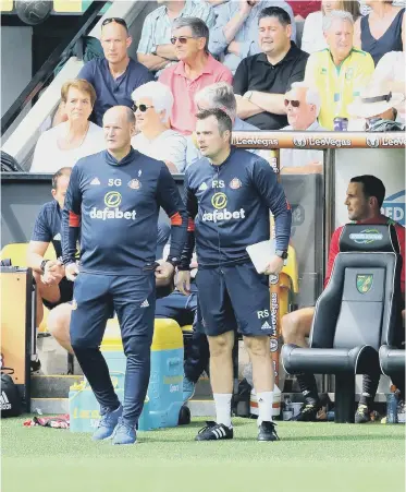  ??  ?? Simon Grayson watches on at Carrow Road as Sunderland stormed to a great victory.