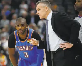  ?? Rick Bowmer / Associated Press ?? Thunder guard Chris Paul, speaking to head coach Billy Donovan, is 34 and is toiling for a rebuilding team after appearing in the playoffs the past 11 seasons.