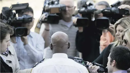  ?? Tyler Anderson / National
Post ?? Toronto Police Chief Mark Saunders speaks to media following his address to the African Canadian Summit
at the OFL Auditorium in Toronto on Wednesday. He defended carding as a key investigat­ive tool.