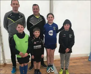  ??  ?? Sligo selector Noel McGuire and Sligo manager Niall Carew with young members of Calry/ StJoseph’s GAA Club Bríain, Dualta, Ceola McGauran and Luke O’Reilly.