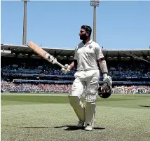  ?? AP ?? Indian batsman Cheteshwar Pujara receives the crowd’s plaudits after being dismissed for 193 against Australia on day two of the fourth test in Sydney yesterday.