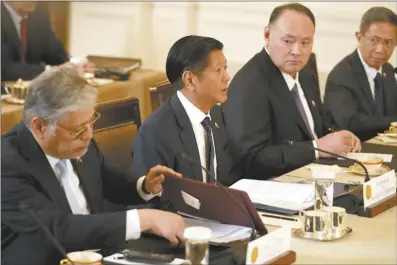  ?? AP photo ?? Philippine President Ferdinand Marcos Jr. (second left), attends a trilateral meeting with President Joe Biden and Japanese Prime Minister Fumio Kishida, not pictured, in the East Room of the White House in Washington on Thursday.