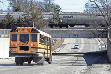  ?? FRED SQUILLANTE/COLUMBUS DISPATCH ?? In order to return to in-person classes and provide transporta­tion to all students who need it, Columbus City Schools is temporaril­y providing COTA bus passes to high school students, officials said.