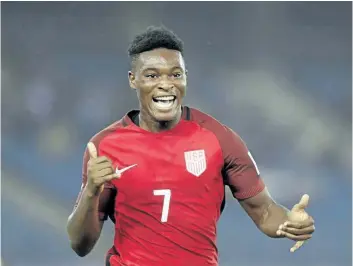  ?? THE CANADIAN PRESS FILES ?? Ayo Akinola celebrates a goal for the United States against Ghana in the FIFA U-17 World Cup match on Oct. 9. Toronto FC has signed the highly touted teenage forward, a U.S. under-17 internatio­nal, as a homegrown player.