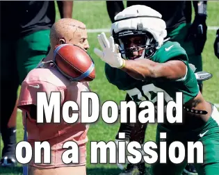  ?? Noah K. Murray ?? TAKE HIS HEAD OFF: Will McDonald, the Jets’ first-round pick, is flying under the radar in his first camp, but he’s ready to announce his presence in a big way.