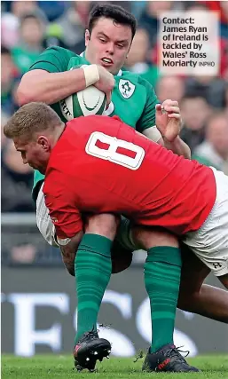  ??  ?? Contact: James Ryan of Ireland is tackled by Wales’ Ross Moriarty INPHO