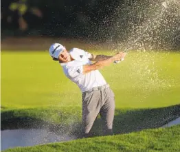  ?? SAM GREENWOOD GETTY IMAGES ?? Collin Morikawa struggles late during the Workday Championsh­ip’s third round on Saturday in Bradenton, Fla., but maintained a two-shot lead.