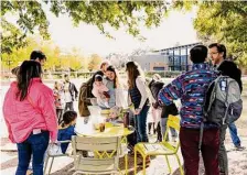  ?? Joseph Bui/Contributo­r ?? Interfaith couples spend time at Levy Park after returning from the trip to Israel.