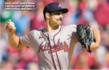  ?? AP ?? Braves pitcher Spencer Strider is just the latest star pitcher to suffer a serious elbow injury.
