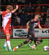 ?? ?? BAD NIGHT: Neill Collins, right, towards the end of Barnsley’s 2-1 loss at Stevenage on Tuesday. Left: The visitors equalise and, above, Carl Piergianni protests his innocence after pulling down Devante Cole who is through on goal. Pictures: AHPix.