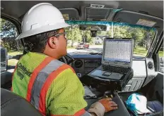  ?? Steve Gonzales / Houston Chronicle ?? Constructi­on and maintenanc­e operator Noah Balderas is one of CenterPoin­t’s 8,000 employees.