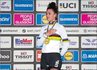  ?? JANE BARLOW/PA/AP PHOTO ?? USA’s Chloe Dygert celebrates with the gold medal after winning the Women’s Elite Individual Time Trial during day eight of the 2023 UCI Cycling World Championsh­ips on Thursday in Stirling, Scotland.