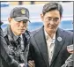  ?? JEAN CHUNG / BLOOMBERG ?? Samsung Electronic­s Vice Chairman Jay Y. Lee (right) arrives at the Special Prosecutor’s Office in Seoul, South Korea, on Feb. 18.