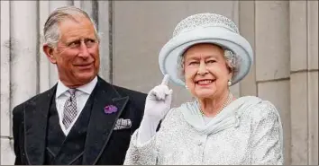  ?? Stefan Wermuth / Associated Press file ?? Britain will celebrate Queen Elizabeth II’S 70 years on the throne this week with four days of pomp and pageantry in London. She is seen here with her son, Prince Charles.