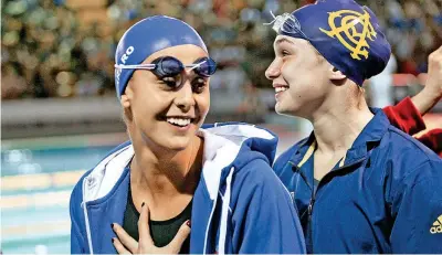  ??  ?? Martina Carraro, 26 anni e, a destra, Benedetta Pilato, 14 anni: hanno vinto le medaglie d’argento e d’oro agli Europei di nuoto in vasca corta