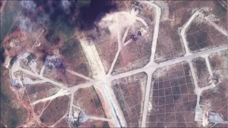  ?? DIGITALGLO­BE VIA AP ?? This satellite image provided by DigitalGlo­be shows an image captured on April 7 of the northwest side of the Shayrat air base in Syria, following U.S. Tomahawk Land Attack Missile strikes on Friday from the USS Ross (DDG 71) and USS Porter (DDG 78)....