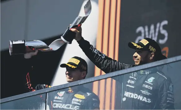  ?? ?? Third placed Lewis Hamilton of Mercedes celebrates on the podium during the F1 Grand Prix of Canada at Circuit Gilles Villeneuve.