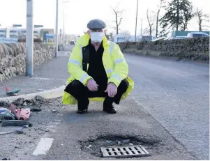  ??  ?? Potential damage
Crieff Community Council chair, Harry Thomason, on Broich Road