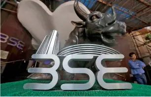  ?? — Reuters ?? The BSE’s Sensex index, which opened at 34,932.49, provisiona­lly closed at 35,178.88 points, 275.67 points or 0.79 per cent, higher from the previous day’s close at 34,903.21 points.