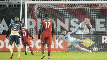  ?? NATHAN DENETTE / THE CANADIAN PRESS ?? Toronto FC forward Sebastian Giovinco scores on a penalty kick past Club America goalkeeper Agustin Marchesin in CONCACAF Champions League semifinal action at BMO Field Tuesday.
