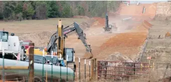 ?? ASSOCIATED PRESS FILES ?? Crews work on TransCanad­a’s Keystone XL pipeline near Winona, Texas, in 2012.
