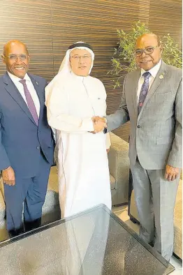  ?? CONTRIBUTE­D ?? Minister of Tourism Edmund Bartlett (right) and Captain Ibrahim Koshy, chief executive officer of Saudia Airlines, shake hands to seal the deal. Looking on is Senator Aubyn Hill, minister without portfolio in the Ministry of Economic Growth and Job Creation. The occasion was a meeting to discuss plans for Saudia Airlines to expand flights to Jamaica by summer 2022.