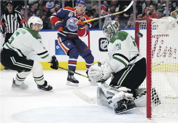  ?? DAVID BLOOM ?? Edmonton Oilers forward Connor McDavid just misses the top corner on Dallas Stars goalie Antti Niemi, who was burnt bad Tuesday in Edmonton’s 7-1 win at Rogers Place. Things were going so well offensivel­y for the Oilers, they didn’t get a point from McDavid until the seventh goal.