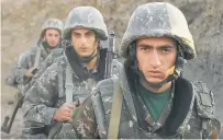  ?? Photo / AP ?? Armenian solders guard their position in Nagorno- Karabakh, Azerbaijan.