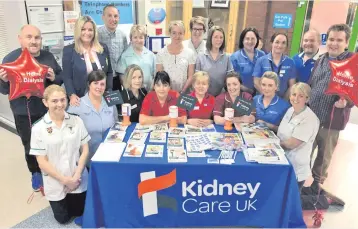  ??  ?? Informativ­e day: Daisy Hill’s Renal Team at the roadshow with NI Kidney Care ambassador Jo-Anne Dobson, advocacy officer William Johnston, Andrew Cromwell and Mark Dobson