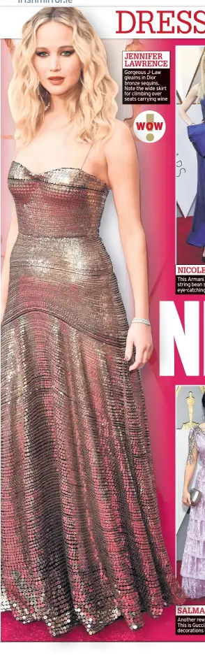  ??  ?? Gorgeous J-law gleams in Dior bronze sequins. Note the wide skirt for climbing over seats carrying wine This Armani Prive gown gave the string bean star an unusual – but eye-catching – silhouette Another reworked valance blind. This is Gucci, with...