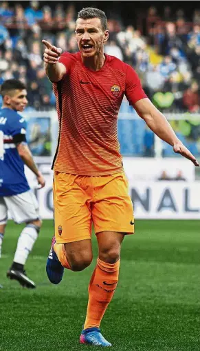  ??  ?? Should be a cinch: AS Roma are tipped to reach the Europa League last 16, thanks to Edin Dzeko’s hat-trick in the 4- 0 first-leg win over Villarreal last week. — Reuters