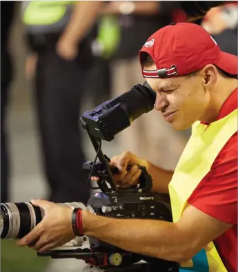  ?? Courtesy Ohio State/tns ?? Zach Swartz, Ohio State football’s director of creative media and post-production, heads a five-person staff that connects the football program with recruits. “In the age that we’re in, social media is a big part of it,” Swartz said. “It helps give guys status.”