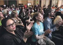  ?? Genaro Molina Los Angeles Times ?? AIRBNB BACKERS Jessica Celious, left, and Tami Smith, center, at City Hall. Angelenos now will be allowed to host guests in their “primary residence” only.