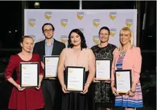  ??  ?? Celebratin­g their success are (from left) Ariela Randall, Dan Jones, Erin Jones-Hadaway, Katherine Rae and Gina Deithe.