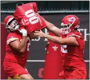  ?? (AP/Charlie Riedel) ?? Rookie center Creed Humphrey (right), seen here working in a drill with teammate Wyatt Miller, is part of a new-look offensive line for the Kansas City Chiefs. Humphrey was drafted in the second round from Oklahoma, where he was a two-time Big 12 Conference offensive lineman of the year.