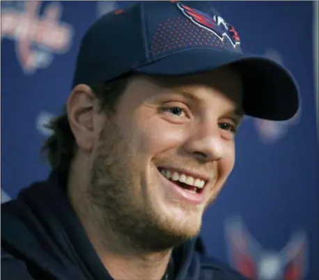  ?? THE ASSOCIATED PRESS ?? Washington Capitals’ John Carlson smiles during a media availabili­ty Monday at the team’s practice facility.