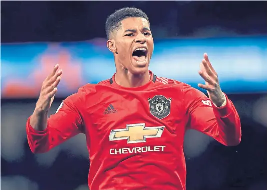  ??  ?? CAMPAIGNER: Manchester United player Marcus Rashford shamed Westminste­r into funding free school meals during the summer