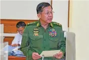  ?? (AFP) ?? Myanmar’s military chief Min Aung Hlaing making a speech during a defense and security council meeting in Naypyidaw on Tuesday