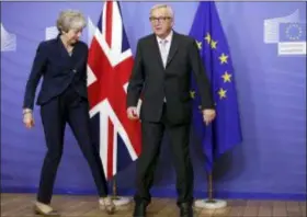  ?? OLIVIER MATTHYS — THE ASSOCIATED PRESS ?? European Commission President Jean-Claude Juncker, right, greets British Prime Minister Theresa May prior to a meeting at EU headquarte­rs in Brussels, Saturday. British Prime Minister Theresa May is kicking off a big Brexit weekend by traveling to EU headquarte­rs in Brussels for talks on Saturday with key leaders.