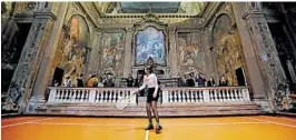  ?? ANTONIO CALANNI/AP 2017 ?? A woman plays tennis last year as part of an installati­on of American artist Asad Raza, set in the 16th-century San Paolo Converso deconsecra­ted church in Milan, Italy.