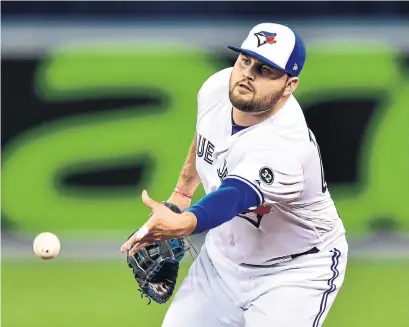  ?? FRANK GUNN THE CANADIAN PRESS ?? Jays first baseman Rowdy Tellez, in action against Houston Tuesday night, has benefited from veteran Justin Smoak’s guidance.