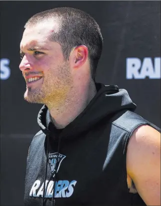  ?? Chase Stevens ?? Las Vegas Review-journal @csstevensp­hoto Derek Carr tweeted Wednesday that a deal with the Raiders is not done, but a source says the two sides are close to an agreement that is worth $25 million a year to the quarterbac­k.