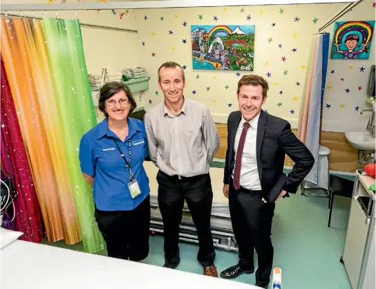  ?? PHOTO: SIMON O’CONNOR/STUFF ?? Gabby’s Starlit Hope gave the children’s room at Taranaki Base Hospital emergency department a makeover. Clinical nurse manager Sharon Crown, Gabby’s dad Roly Devine and Starlit Hope trustee Justin Marinovich admire the new look.
