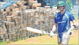  ??  ?? Australian cricketer Steven Smith gestures during a training session ahead of their practice match in Chennai on Monday