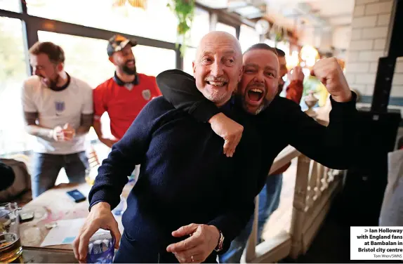  ?? Tom Wren/SWNS ?? Ian Holloway with England fans at Bambalan in Bristol city centre