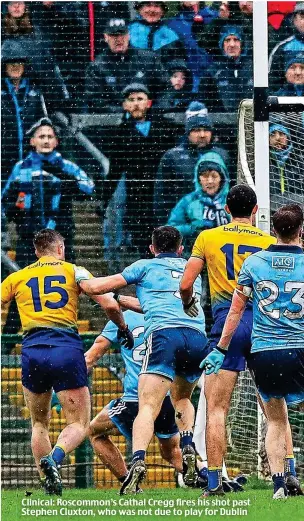  ??  ?? Clinical: Roscommon’s Cathal Cregg fires his shot past Stephen Cluxton, who was not due to play for Dublin