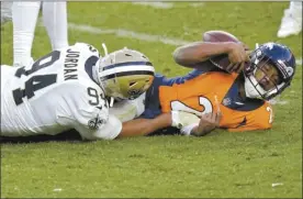  ?? AP photo ?? The Saints’ Cameron Jordan sacks Broncos quarterbac­k Kendall Hinton — a wide receiver on Denver’s practice squad — on Sunday.