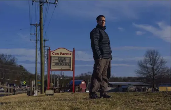  ?? JAHI CHIKWENDIU/THE WASHINGTON POST ?? “We see it as our moral responsibi­lity . . . to engage visibly and actively in the fight for justice,” says Aaron Cox-Leow, whose family farm displays signs that have caused an online furor.