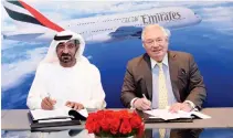  ??  ?? Sheikh Ahmed bin Saeed Al-Maktoum, chairman and chief executive, Emirates Airline and Group, signed the agreement with John Leahy, chief operating officer customers, Airbus Commercial Aircraft.