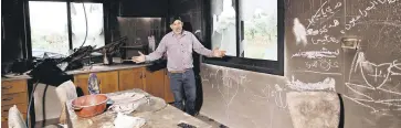  ?? ?? A Palestinia­n man gestures as he stands inside his kitchen in the aftermath of an attack by Israeli settlers in the occupied West Bank village of Al-Mughayyir near Ramallah, Palestine, April 17, 2024.